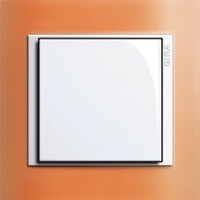 Gira Event Opaque. Цвет рамки: Оранжевый; Цвет вставки и клавиши: Белый глянцевый